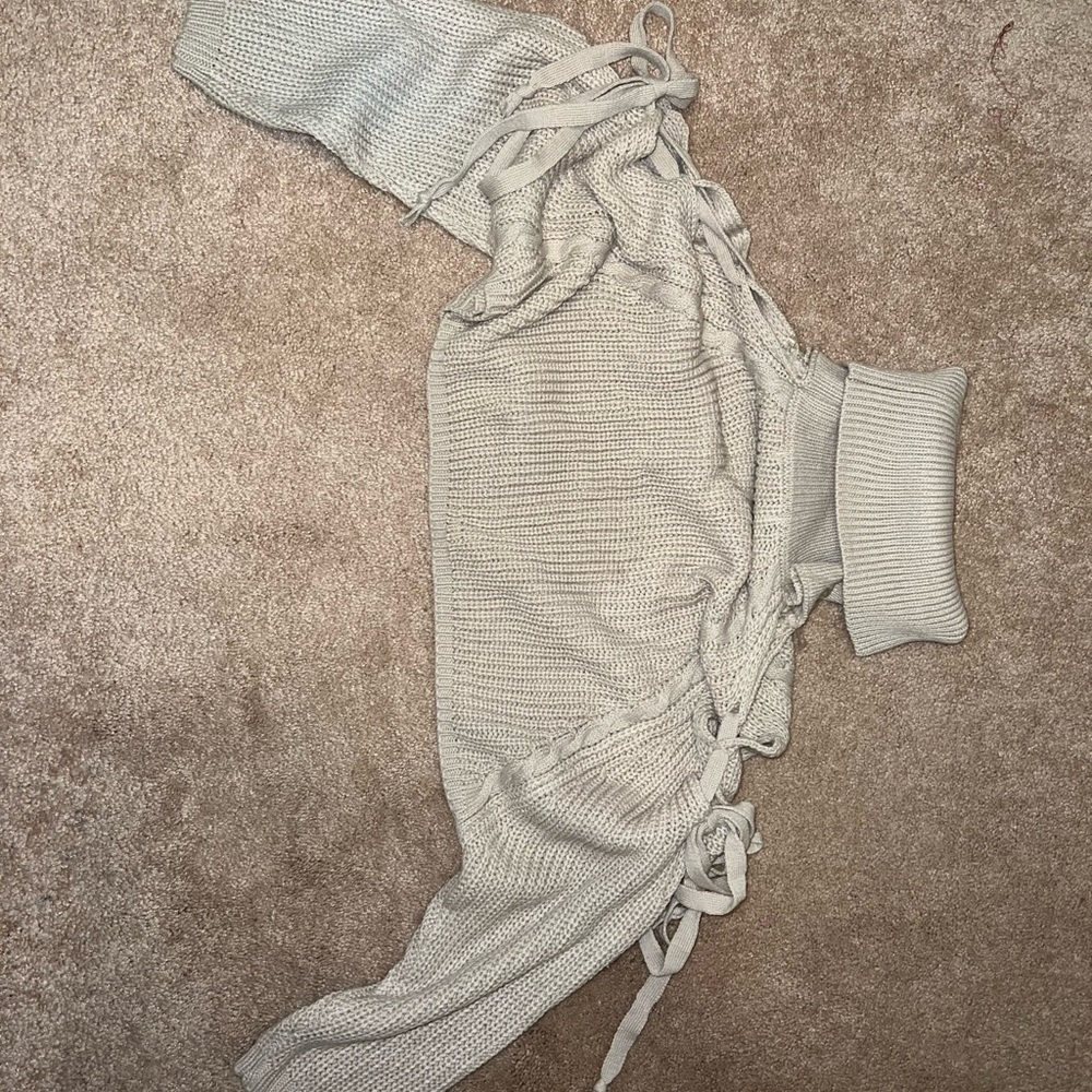 Cropped sweater turtleneck. Soft knit material. Size medium. Never worn.